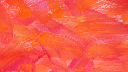 Red paint strokes drawn with brush as background, top viewの写真素材