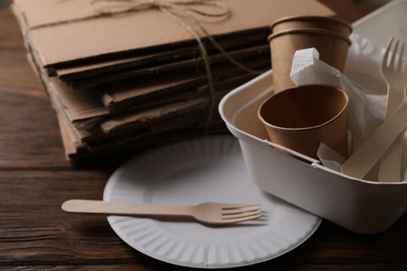 Heap of waste paper on wooden table, closeupの写真素材