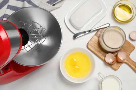 Modern red stand mixer and different ingredients on white table, flat layの写真素材