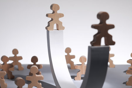 Recruitment process, job competition concept. Wooden human figures on gray tableの写真素材