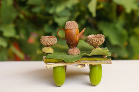 Tea set composition made of natural materials on white wooden table