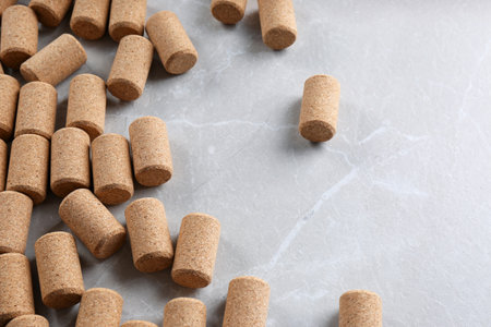 Wine bottle corks on light gray marble table