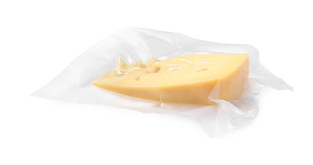 Cheese in vacuum pack isolated on whiteの写真素材