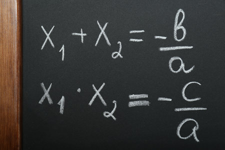 Many different math formulas written on chalkboard, closeupの写真素材