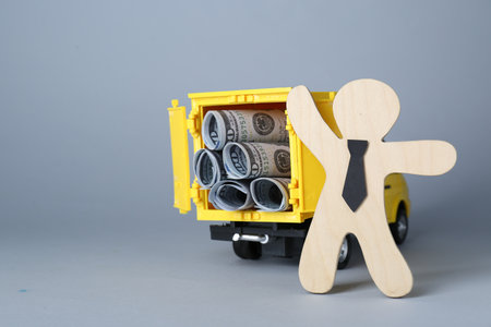 economic profit. Wooden figure and toy truck with banknotes on light gray background, space for text