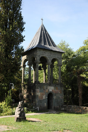 Exterior of beautiful bell tower in park on sunny day
