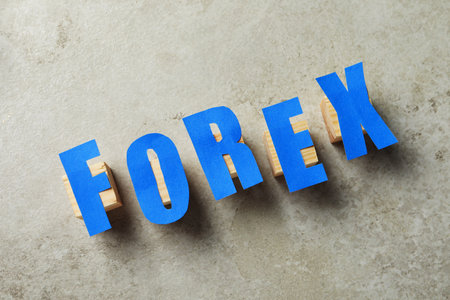 Word Forex made of blue letters and cubes on gray table, flat layの写真素材