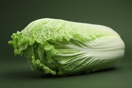 Fresh ripe Chinese cabbage on green background, closeupの写真素材