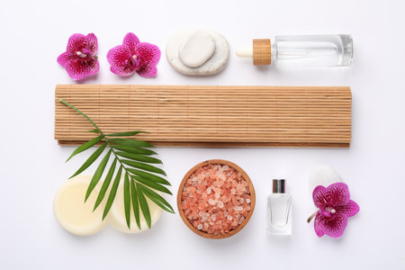 Flat lay composition with different spa products on white backgroundの写真素材