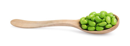 Spoon with fresh edamame soybeans on white backgroundの写真素材