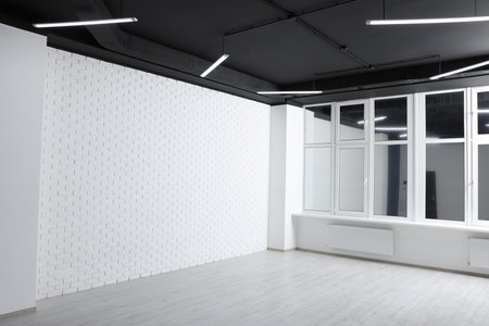 Beautiful window in spacious room during repairの写真素材