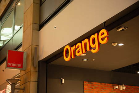 Warsaw, Poland - September 17, 2022: Signboard of Orange store in shopping mallのeditorial素材