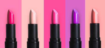 Set with beautiful lipsticks on different color backgrounds. banner designの写真素材