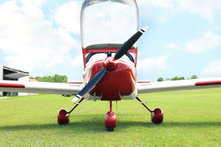 New ultralight aircraft on green grass outdoors