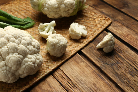 Fresh cauliflower on wooden table. Space for textの写真素材