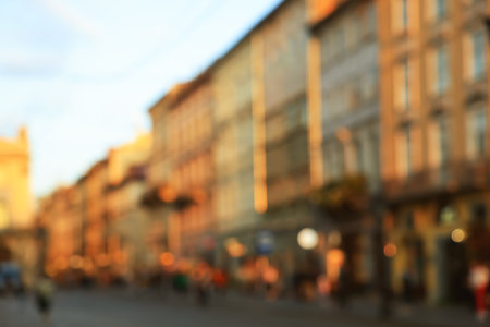 Blurred view of buildings on city streetの写真素材
