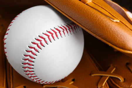 Leather baseball glove with ball, closeup. Sports equipmentの写真素材