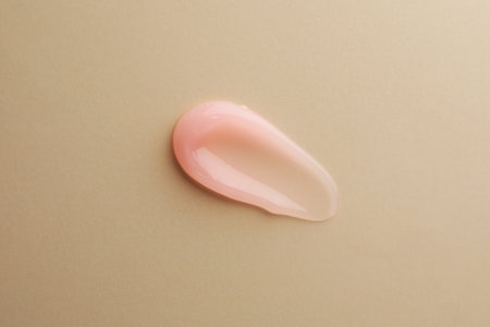 Sample of cosmetic gel on beige background, top viewの写真素材