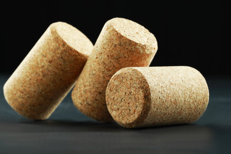 Corks of wine bottles on gray table, closeupの写真素材