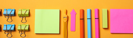 Different school stationery on orange background, flat lay. banner designの写真素材