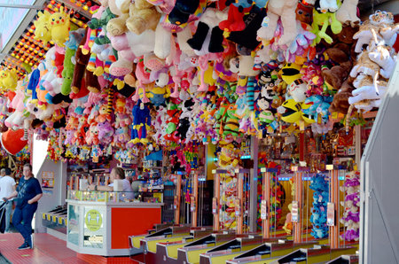 Netherlands, Groningen - May 18, 2022: Beautiful stall with different toys for winning in amusement parkの写真素材