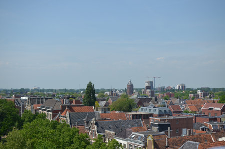 Picturesque view of the city with beautiful buildings under blue skyの写真素材