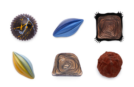 Set with tasty chocolate candies on white background, top viewの写真素材