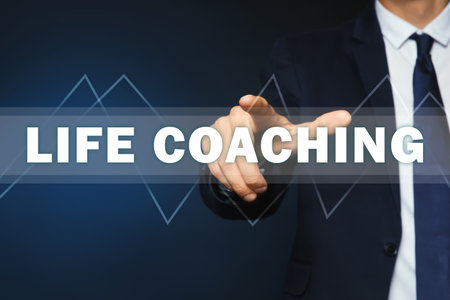 life coaching concept. Businessman touching virtual screen on dark background, closeupの写真素材