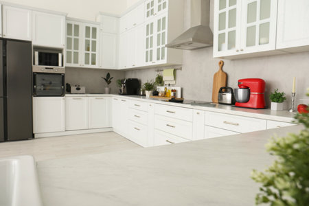 Beautiful kitchen interior with stylish modern furnitureの写真素材