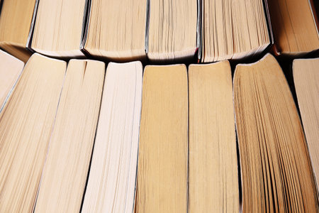 Collection of different books as background, closeupの写真素材
