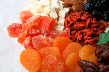 Pile of different dried fruits on white background, closeupの写真素材