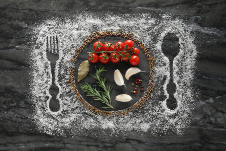 Different spices and silhouettes of cutlery and plate on gray marble background, flat lay
