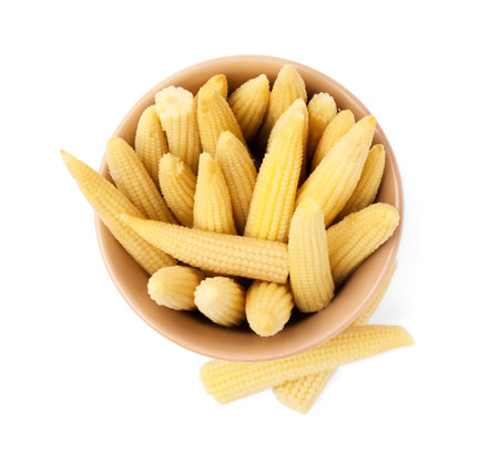 Bowl and pickled baby corn isolated on white, top viewの写真素材