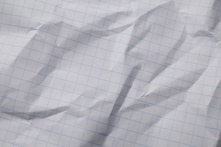Crumpled sheet of paper as background, top viewの写真素材