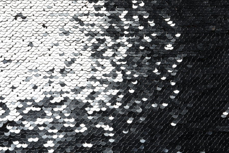 Texture of beautiful bright sequins as background, top view