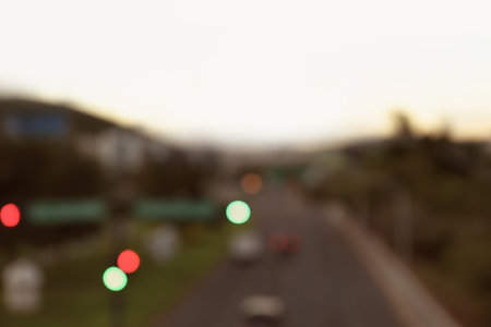 Blurred view of highway in city at eveningの写真素材