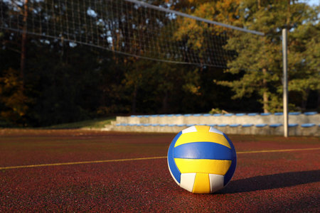 View of colorful ball on volleyball court outdoorsの写真素材