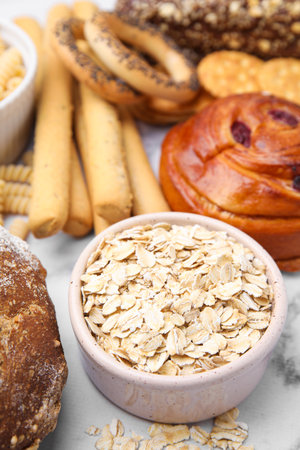 Different gluten free products on white marble table, closeupの写真素材