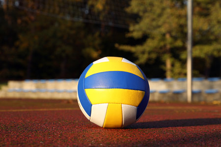 View of colorful ball on volleyball court outdoorsの写真素材