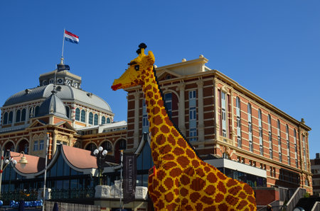 AMSTERDAM, NETHERLANDS - SEPTEMBER 10, 2022: Giraffe figure made with colorful Lego constructor outdoorsのeditorial素材
