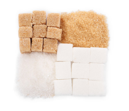 Different types of sugar on white background, top viewの写真素材