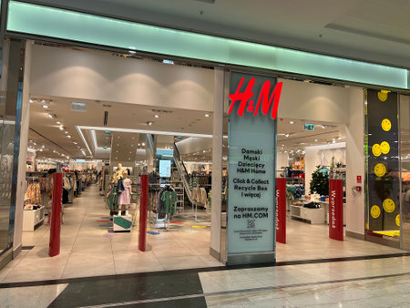 Poland, Warsaw - July 12, 2022: Official H&M store in shopping mallのeditorial素材
