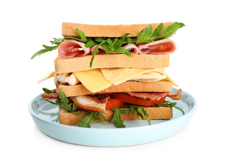 Tasty sandwich with chicken, ham and bacon isolated on whiteの写真素材