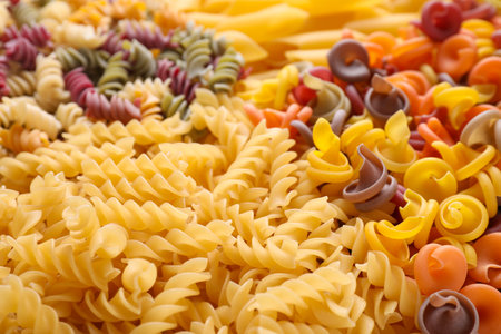 Different types of pasta as background, closeupの写真素材