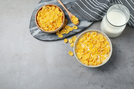 Flat lay composition with tasty corn flakes on light gray tableの写真素材