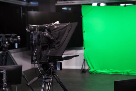 Modern video recording studio with professional equipment, focus on cameraの写真素材