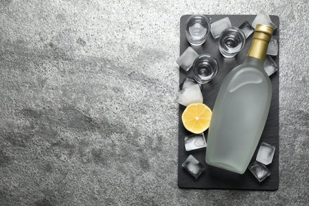 Cold Russian vodka on gray table, top view. Space for textの写真素材
