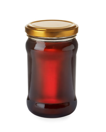 Jar with organic honey isolated on whiteの写真素材