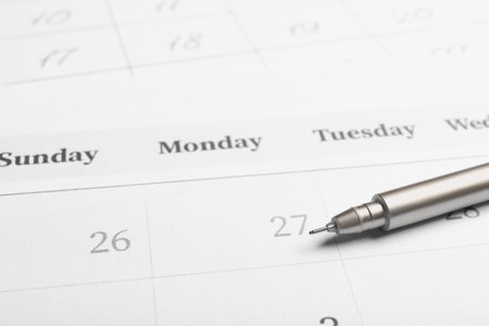 Pen on calendar page, closeup. planning conceptの写真素材