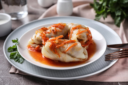 Delicious cabbage rolls served on gray marble table, closeupの写真素材